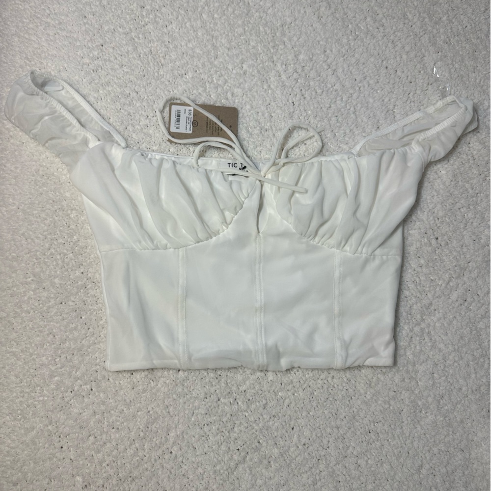 White off the should crop top. NWT